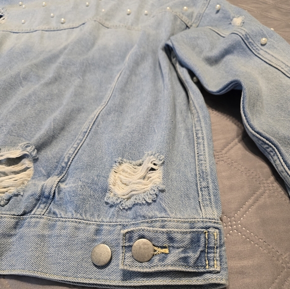 Free People classic cut denim jacket adorned with pearl accents. - Picture 9 of 9